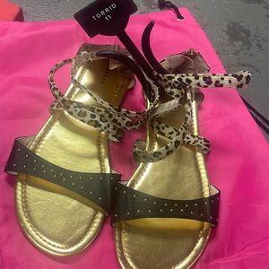 Torrid cheetah print sandals.